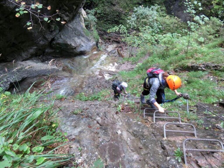 Hiking in Slovak Paradise national park - Via Ferrata Kyseľ - final ascent alongside the Giant waterfall with the aid of metal rungs and cables